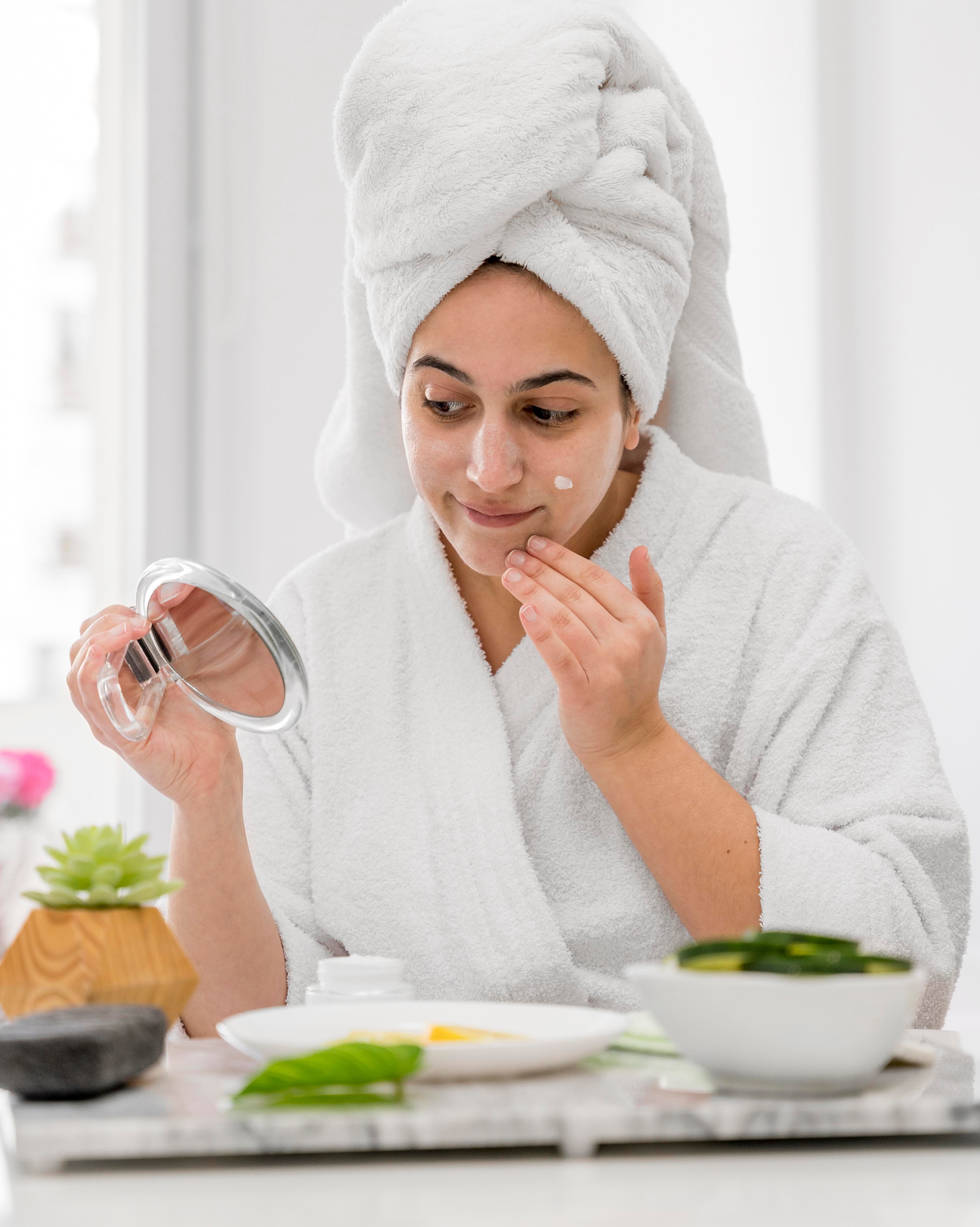 Woman applying cream