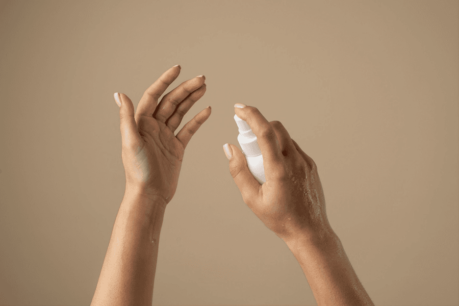 hand holding spray