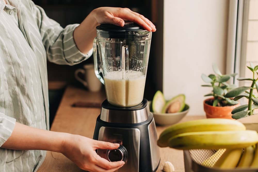 Woman making banana shake