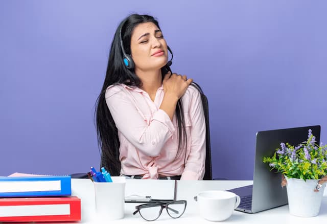 Woman having shoulder pain