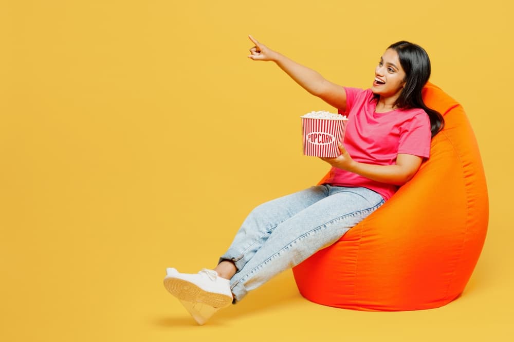 Woman eating popcorn