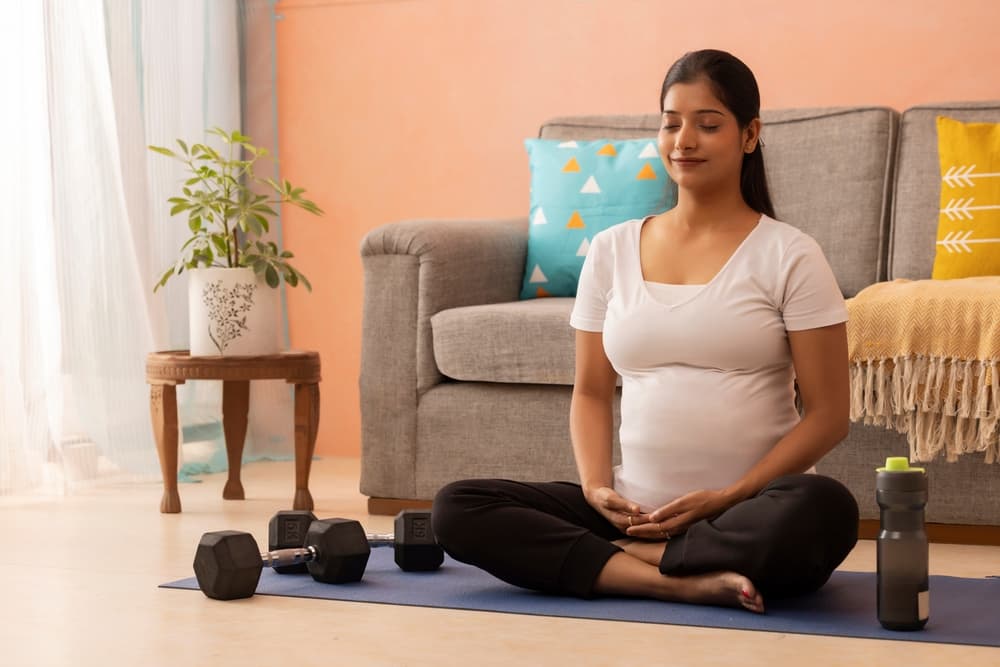 Pregnant woman doing Yoga