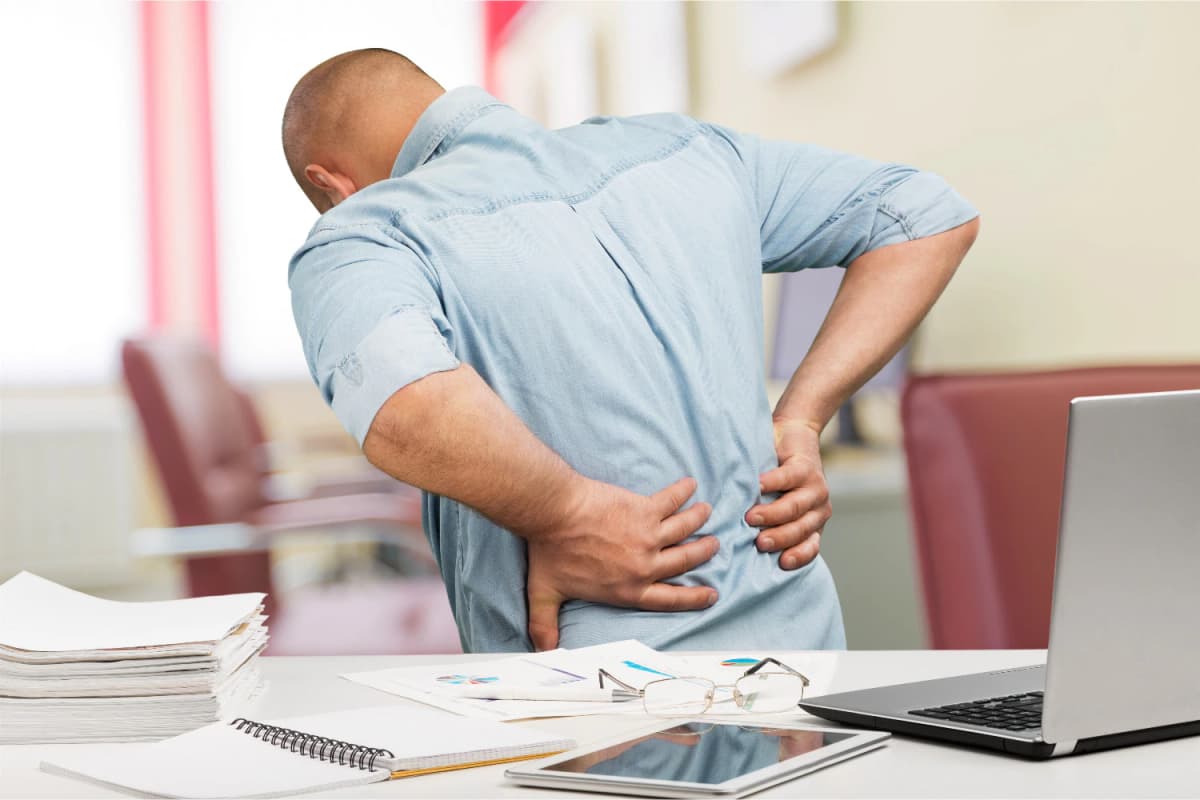 Back pain from desk job: causes, exercises and fast relief tips
